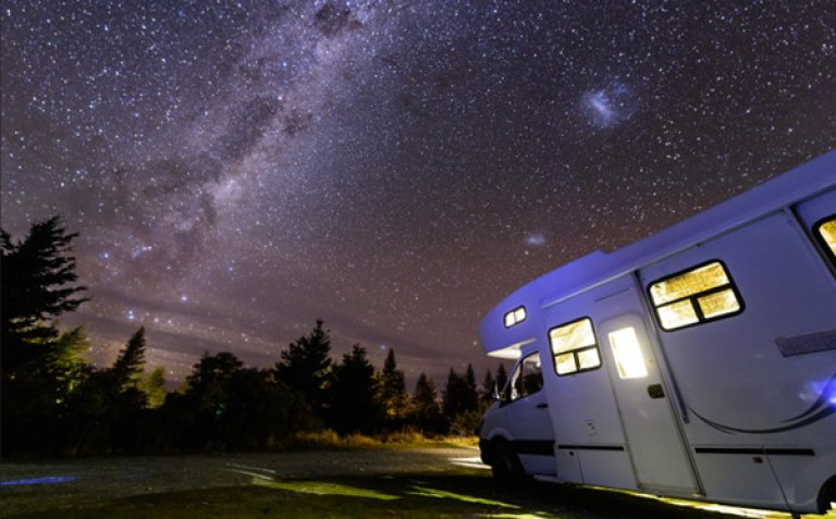 Caravan at night in NZ Shutterstock