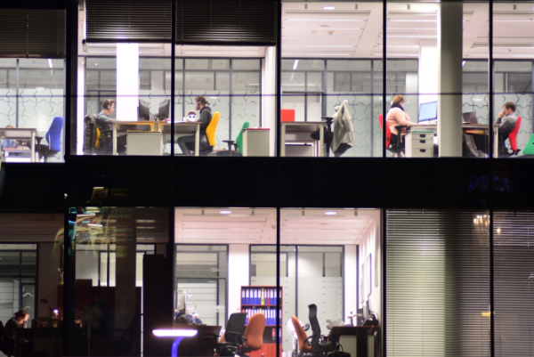 Different images of small office rooms some with lights on and some in the dark.