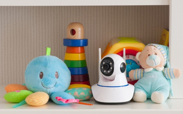 Some babies toys on a shelf
